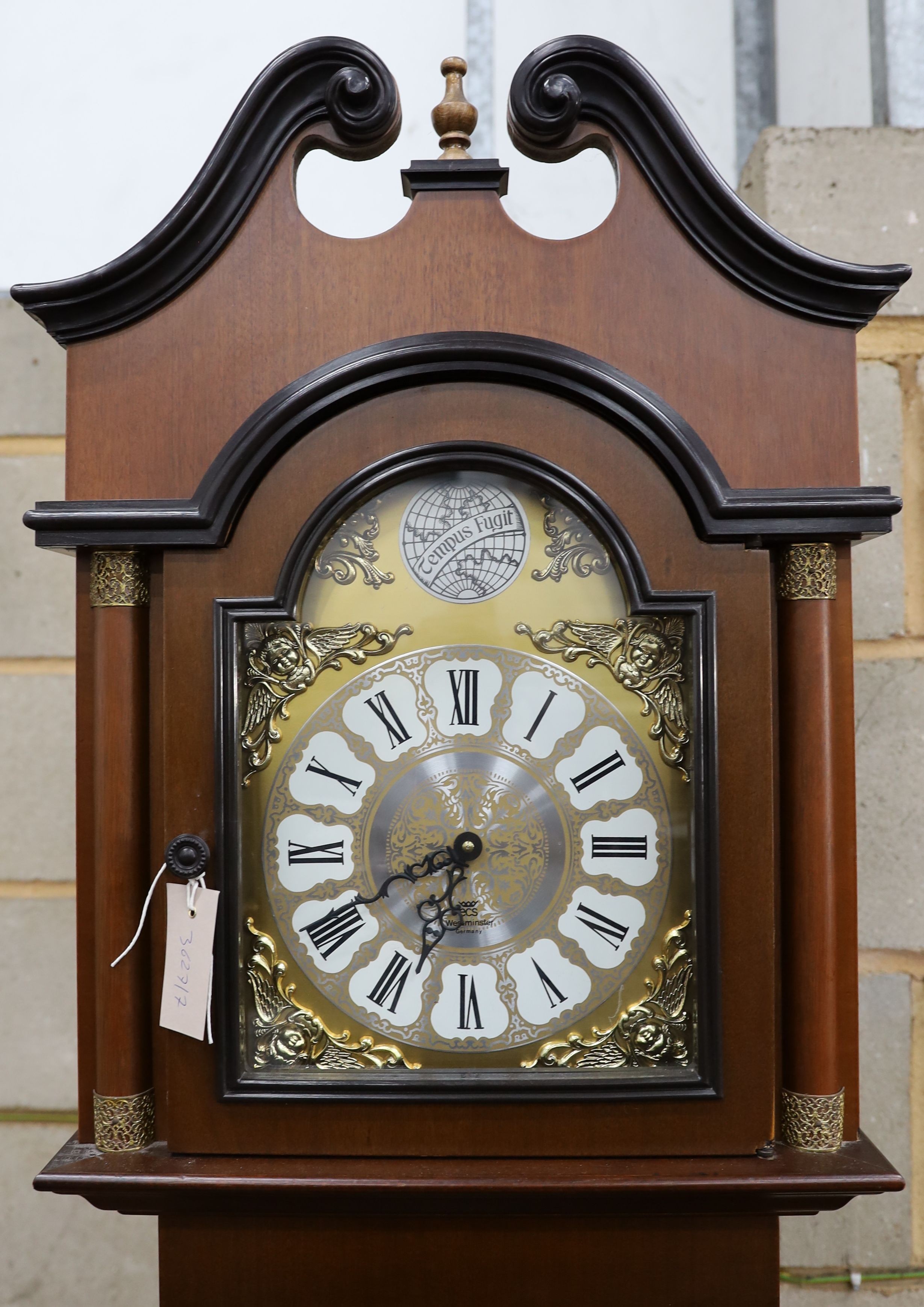 A reproduction German mahogany 'Tempus Fugit' longcase clock, height 215cm